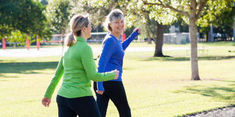 Two older women walking