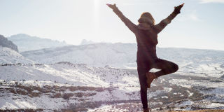 Hilltop yoga pose winter